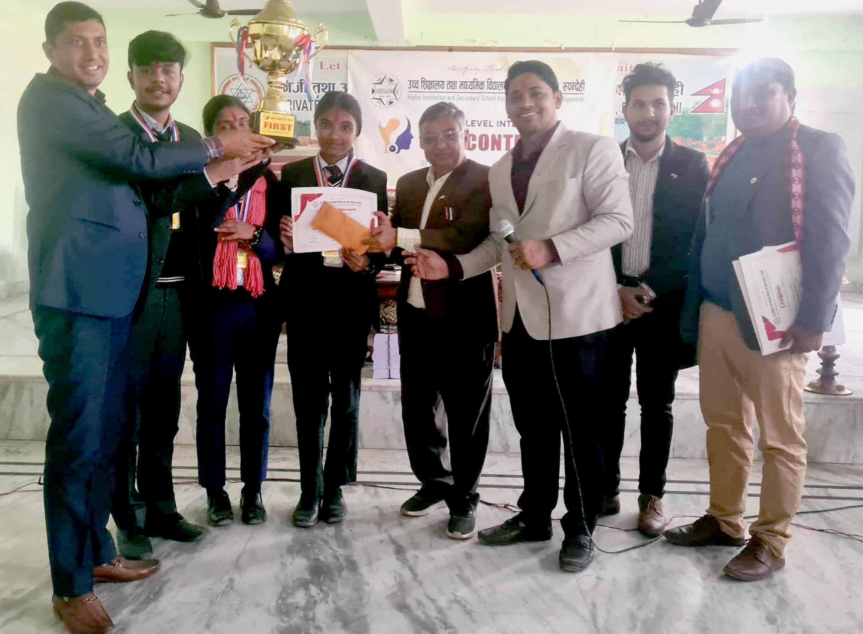 हिसान जिल्ला स्तरीय हाजिरी जवाफ र वक्तृत्वकलाको उपाधि स्कलर्स होम माविलाई